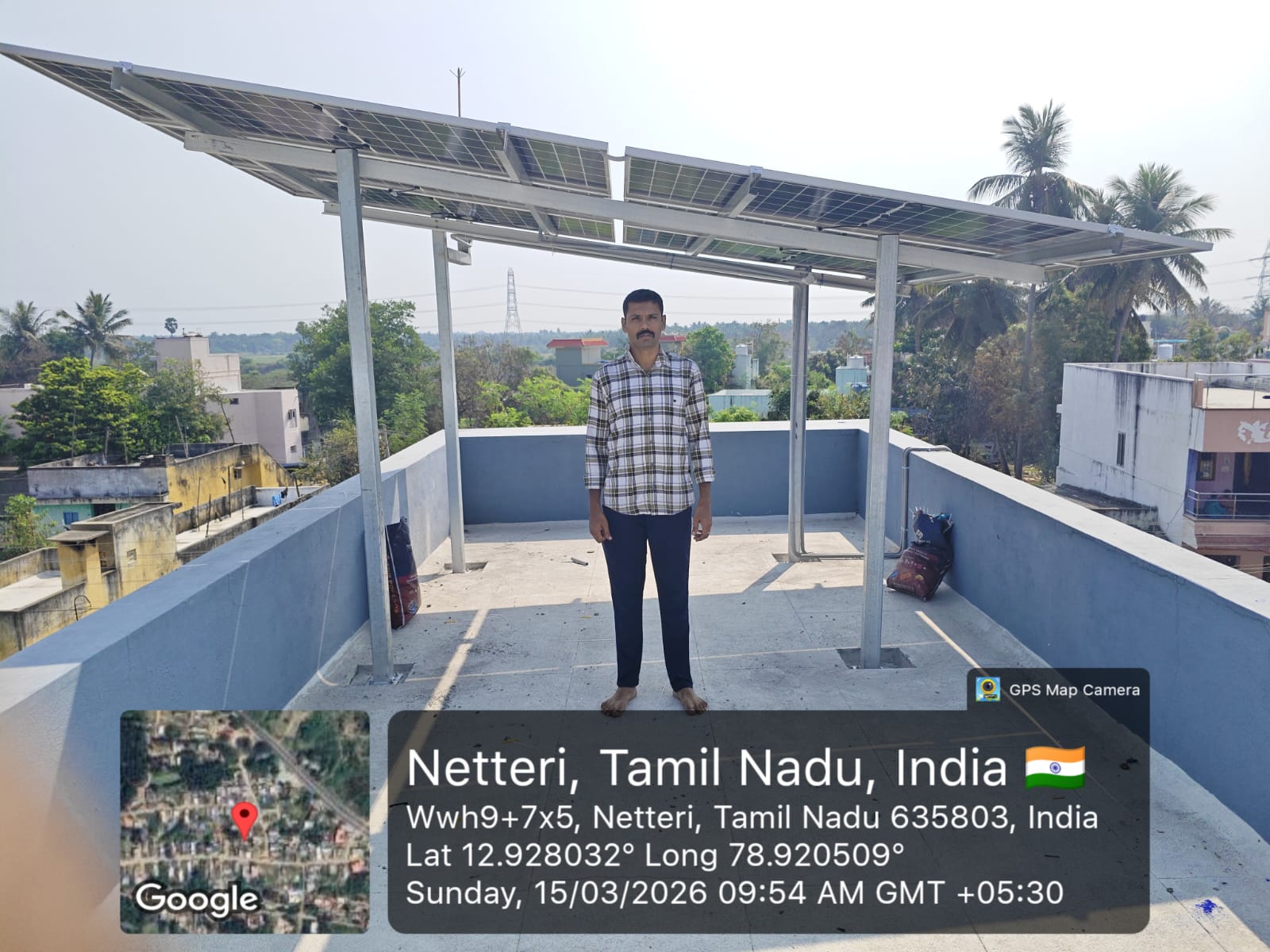 Solar panel installation at Netteri, Tamil Nadu — elevated terrace canopy array.