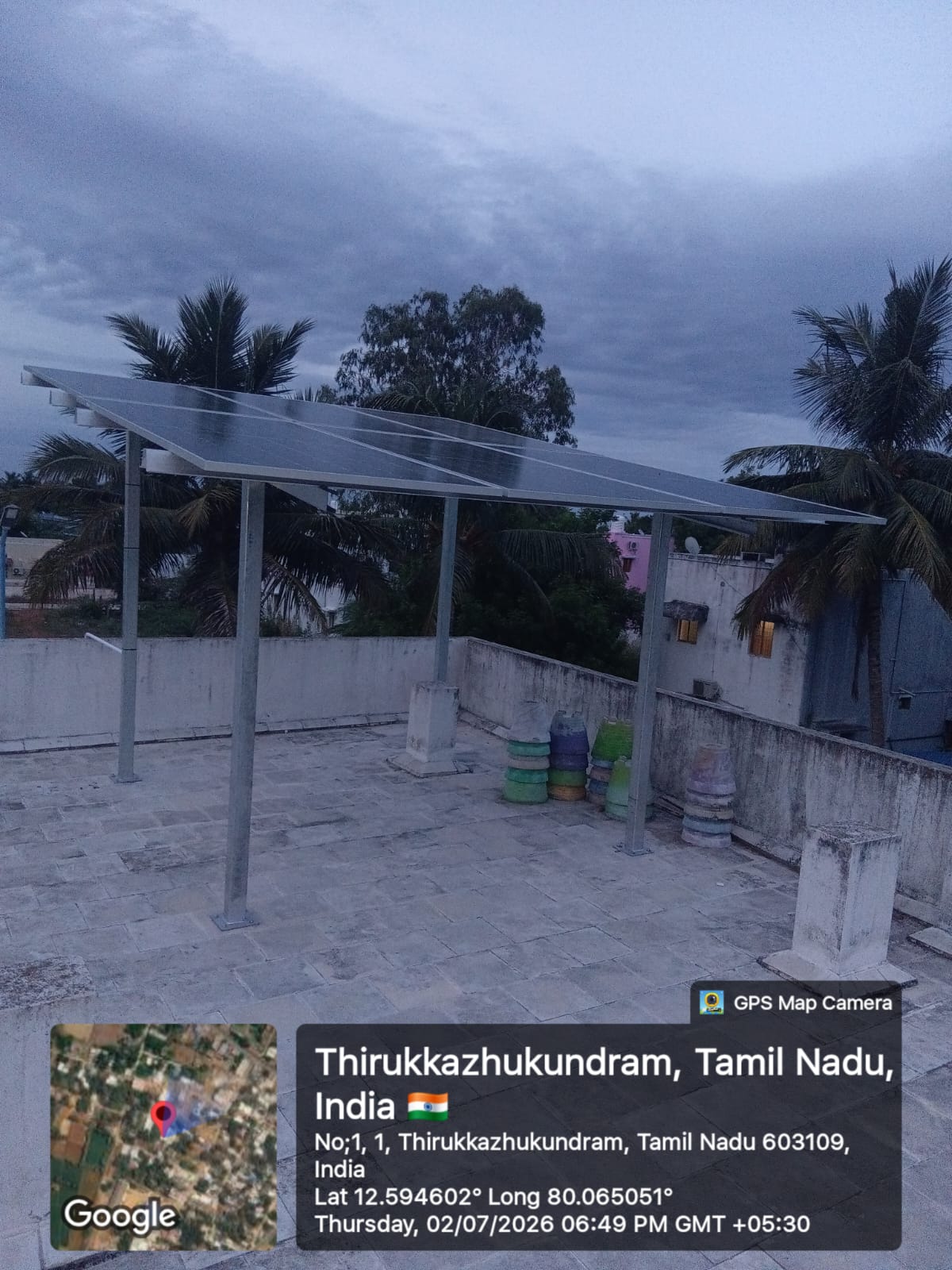 Solar panel installation at Thirukkazhukundram, Chengalpattu — elevated rooftop structure.