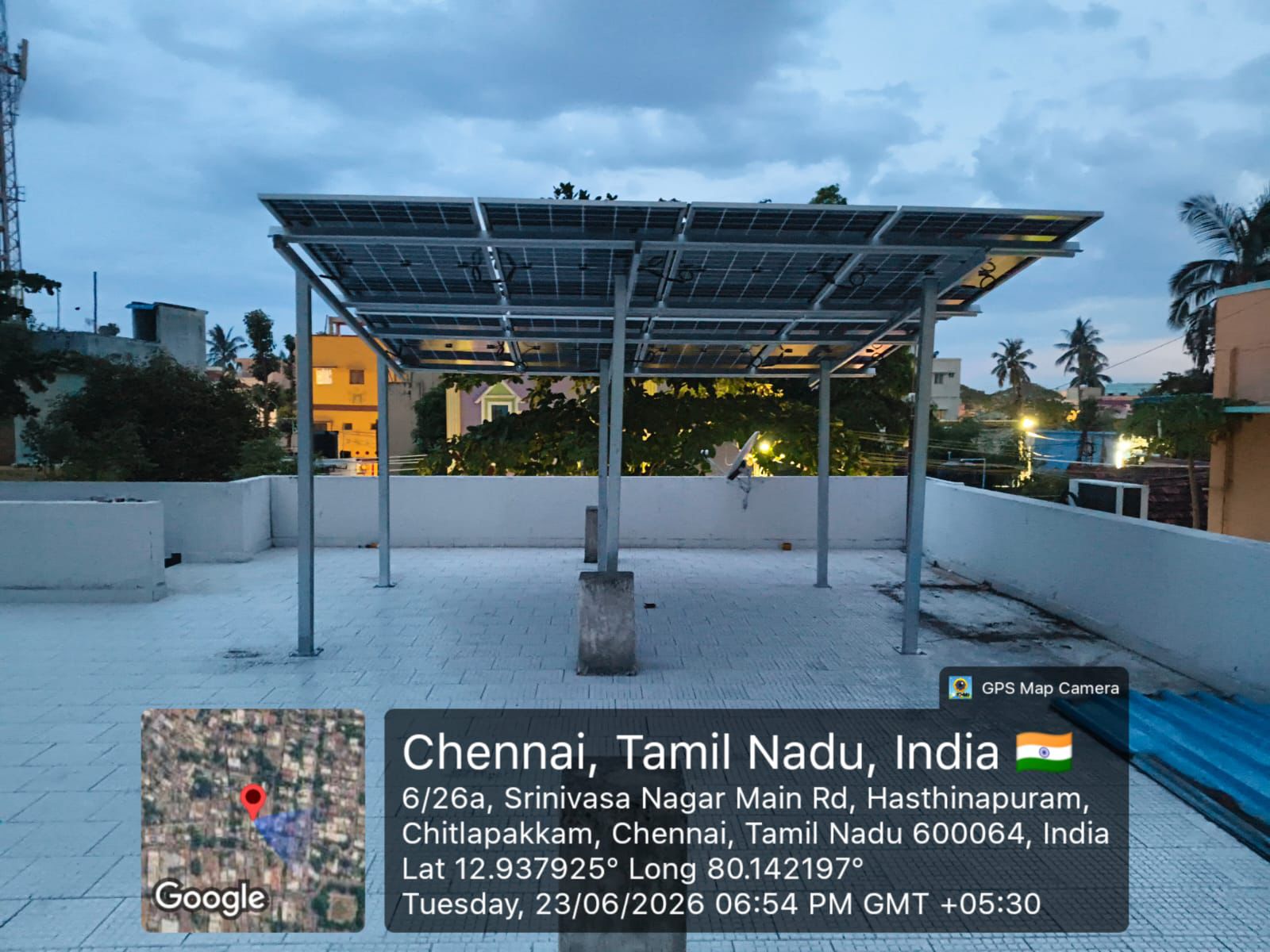 Solar panel installation at Hasthinapuram, Chennai — elevated rooftop array on terrace.