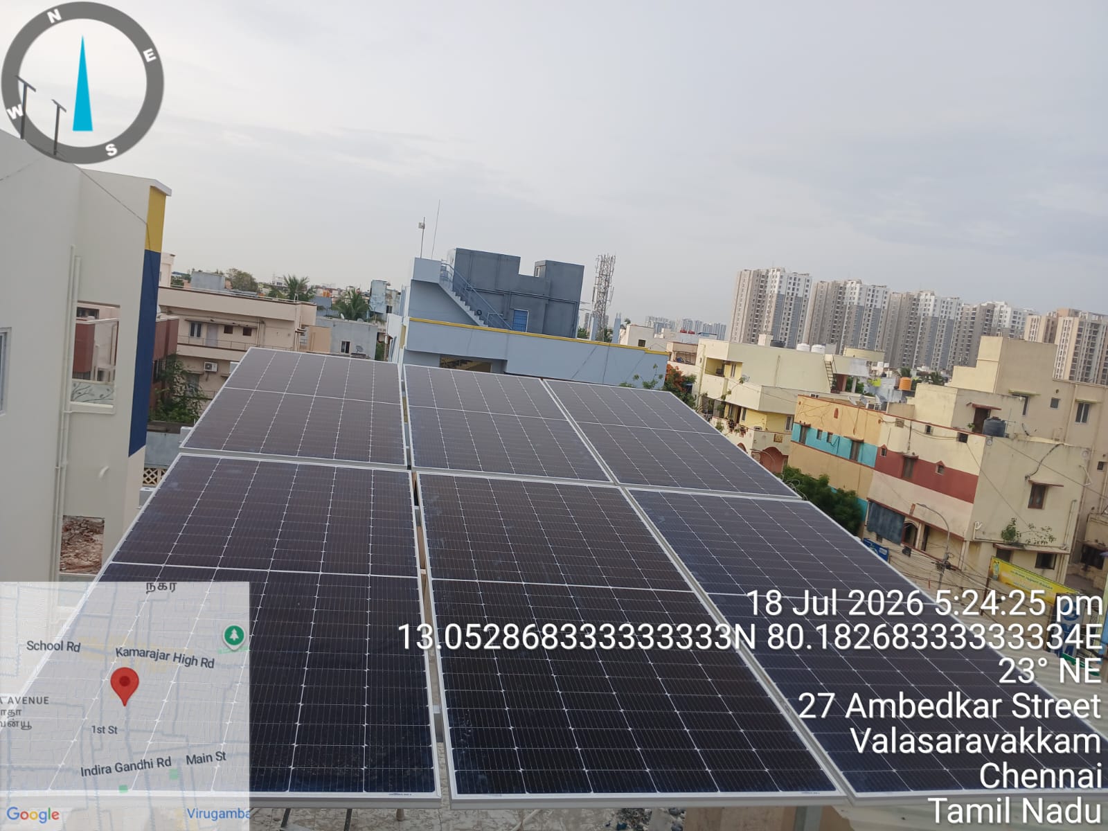 Solar panel installation at Valasaravakkam, Chennai — nine-panel tilted rooftop array.