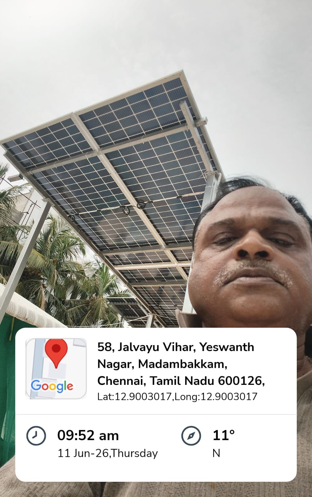Solar panel installation at Jalvayu Vihar, Madambakkam — high-clearance rooftop solar canopy.