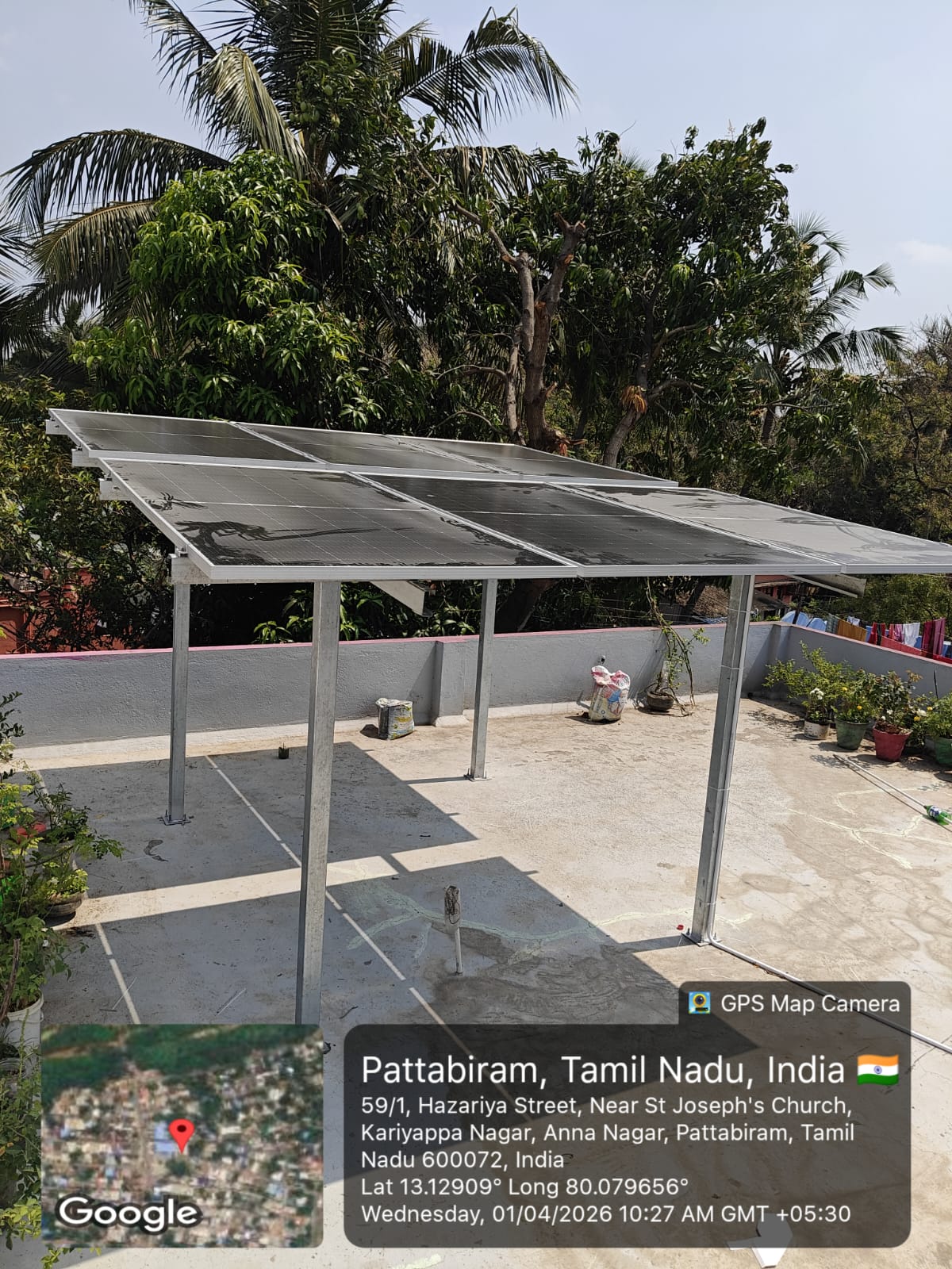 Solar panel installation at Kariyappa Nagar, Pattabiram — six-panel elevated terrace canopy.