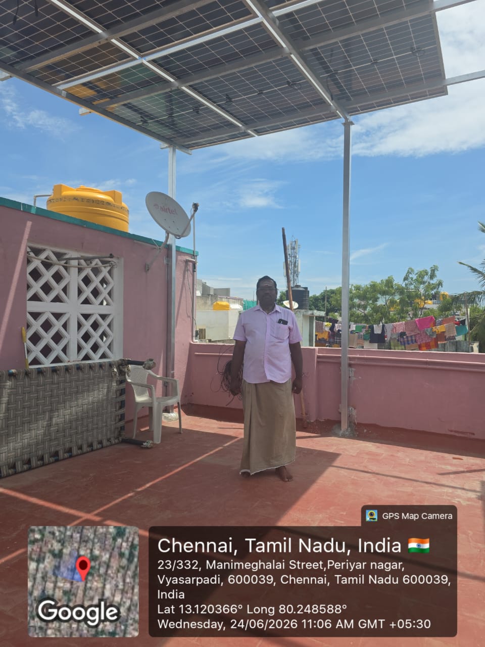 Solar panel installation at Periyar Nagar, Vyasarpadi — elevated terrace solar canopy.