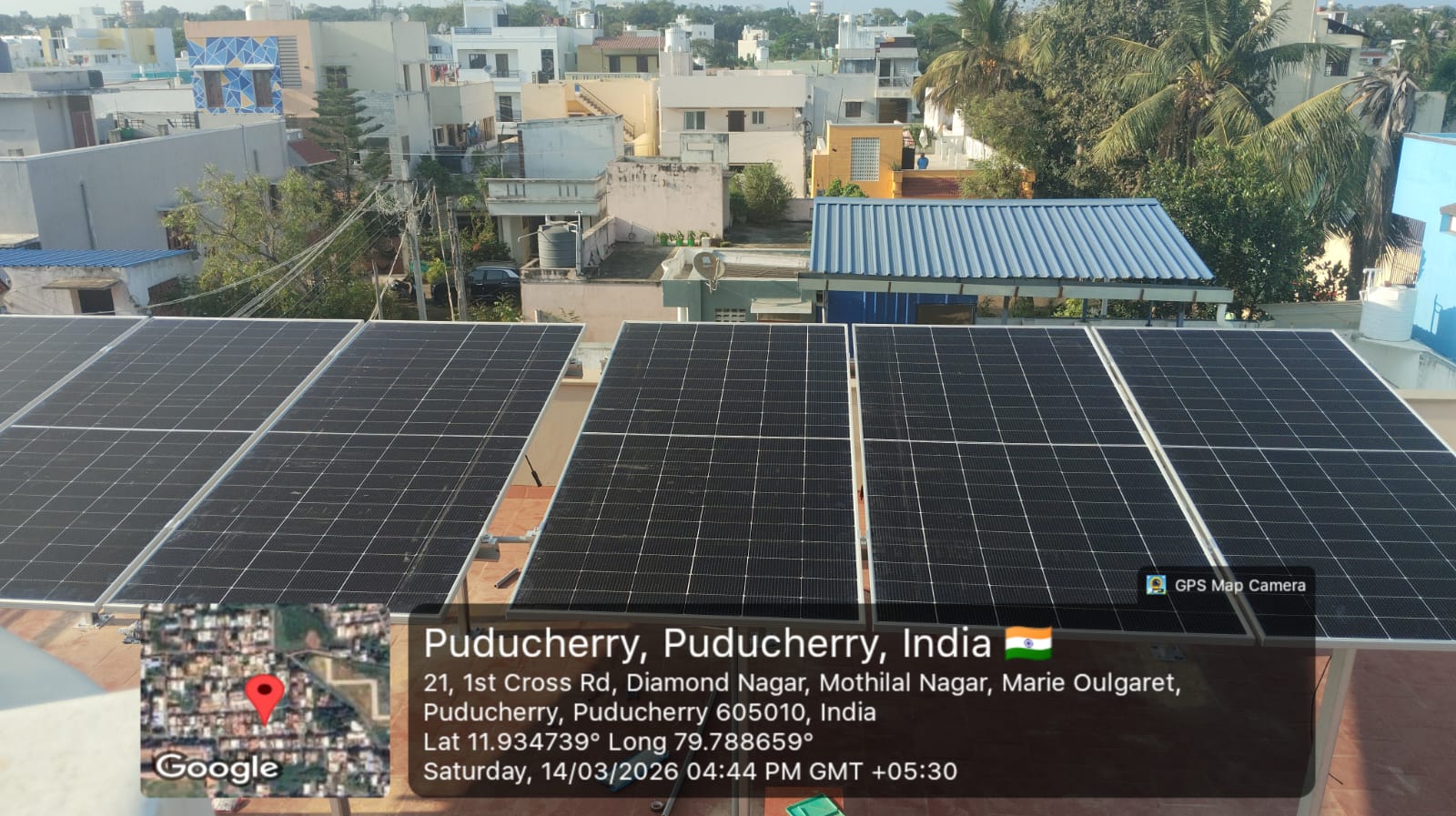 Solar panel installation at Diamond Nagar, Puducherry — tilted rooftop mono PERC array.