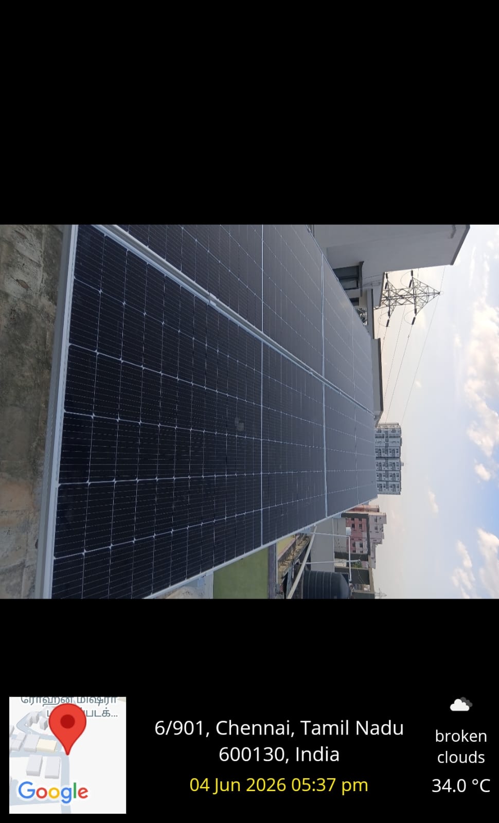 Solar panel installation at Navalur, Chennai — large rooftop array on an industrial shed.