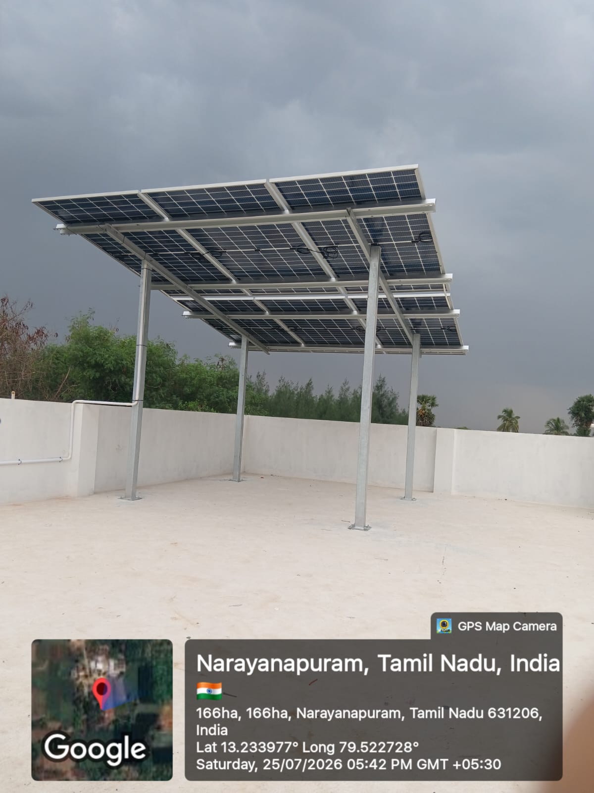 Solar panel installation at Narayanapuram — high-clearance elevated bifacial array.
