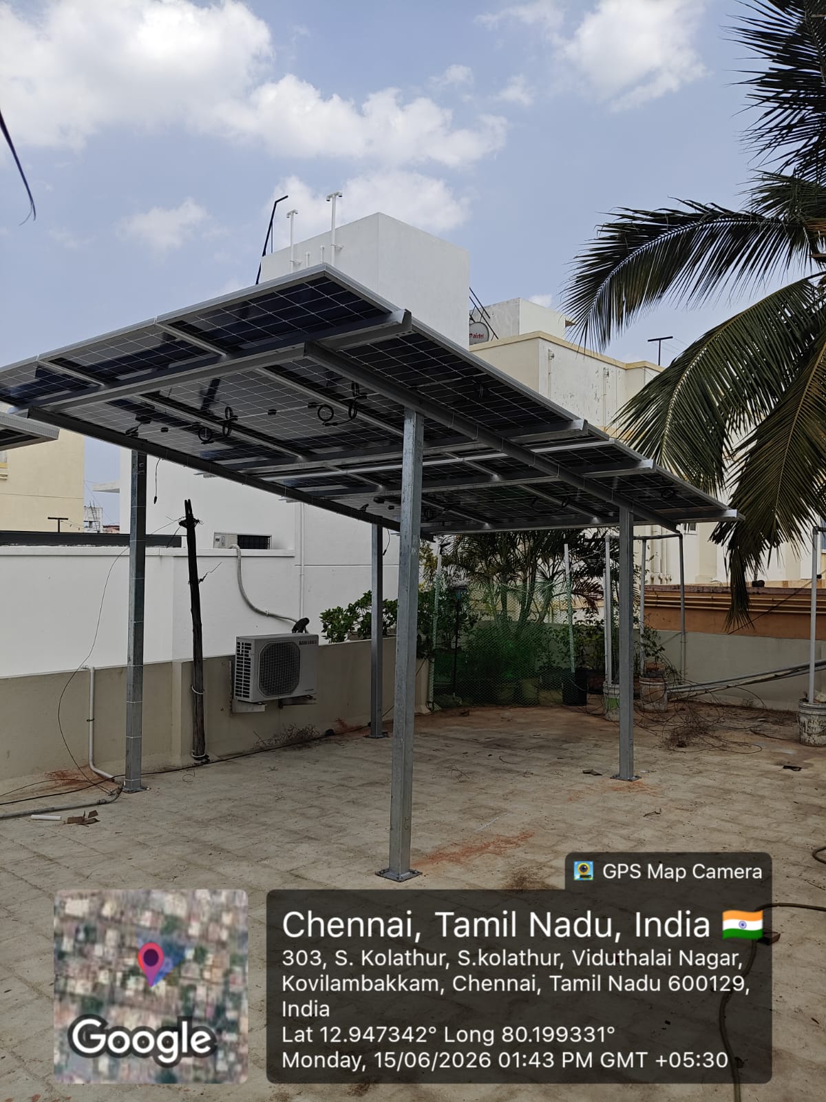Solar panel installation at Kovilambakkam, Chennai — elevated rooftop shed-mount array.