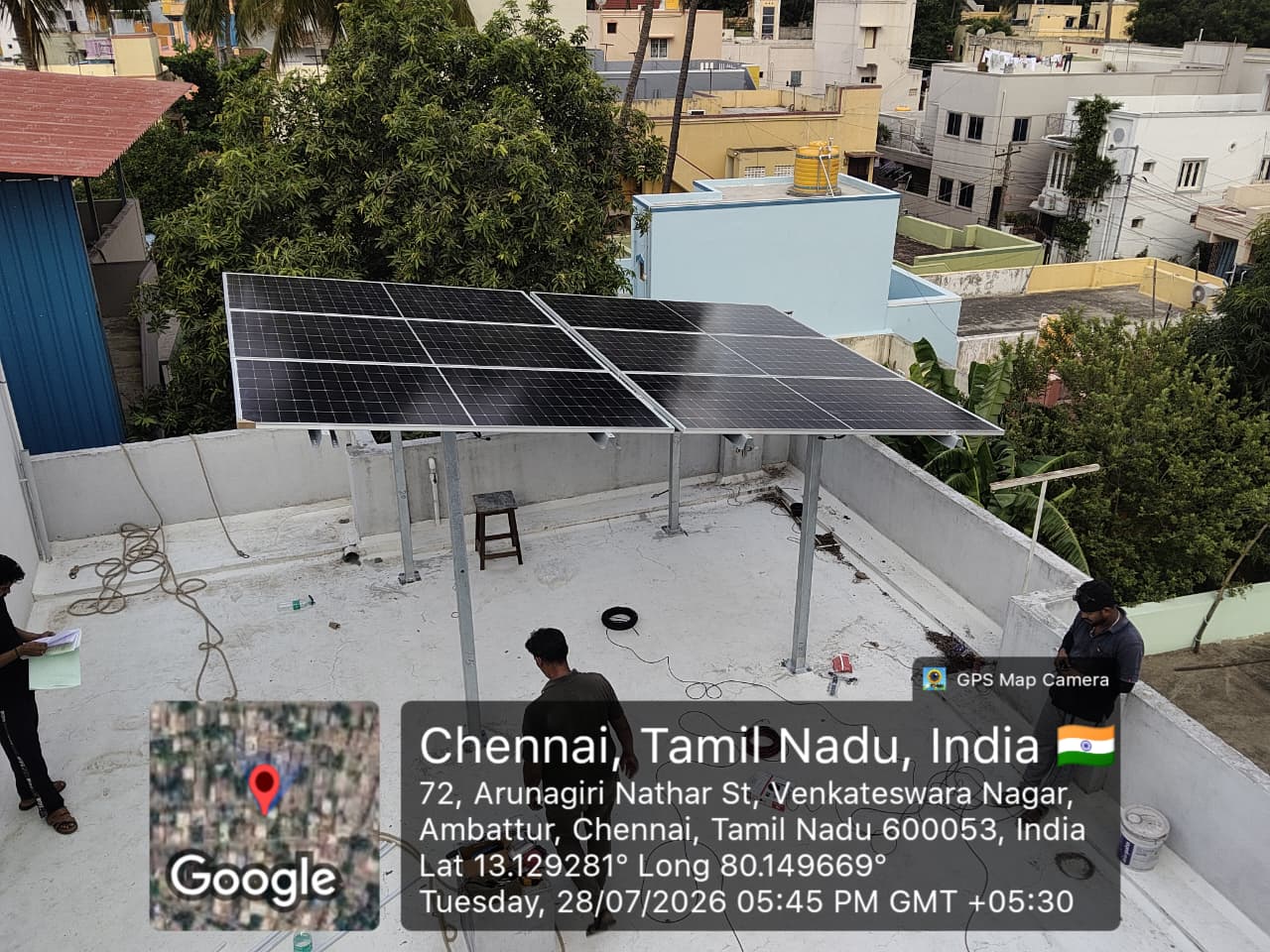 Solar panel installation at Ambattur, Chennai — galvanised elevated mounting structure on terrace.