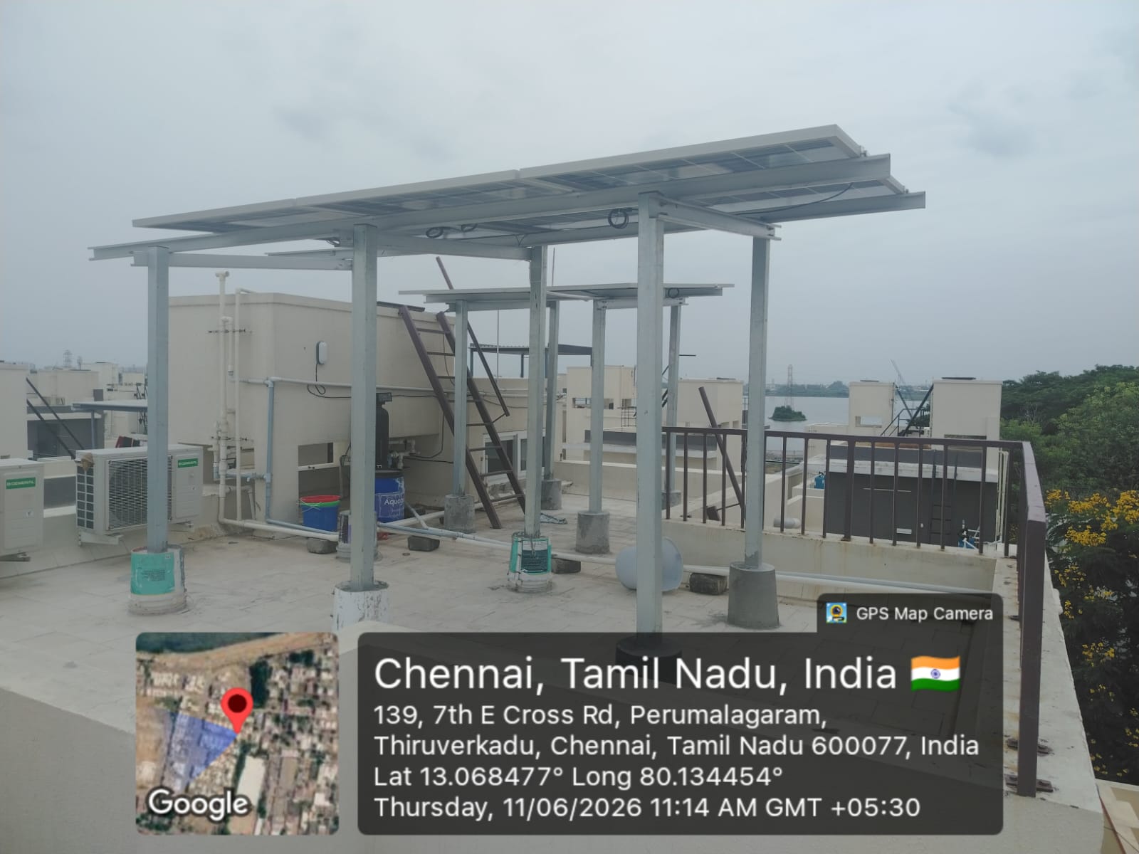 Solar panel installation at Perumalagaram, Thiruverkadu — twin-bay elevated solar canopy.